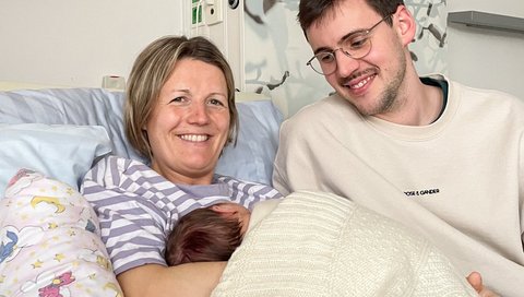 Happy parents Ann-Merlin and Paul with their newborn Titus.