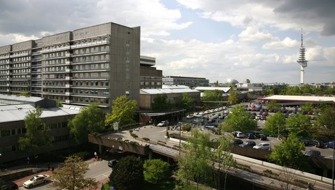 View from above of the central ward block with parking deck and surrounding buildings.
